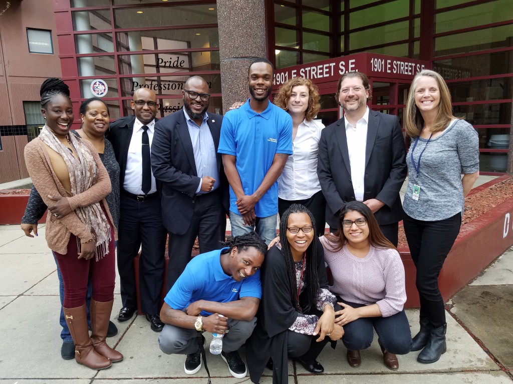 Coe Booth with Free Minds and DOC staff, and Councilmember David Grosso and staff member