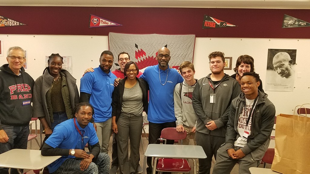 Free Minds staff and Poet Ambassadors with students