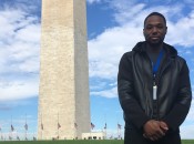 Nick stands in front of the Washington Monument