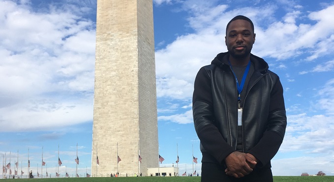 Nick stands in front of the Washington Monument