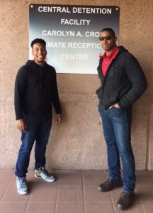 Two men stand outside the DC Jail
