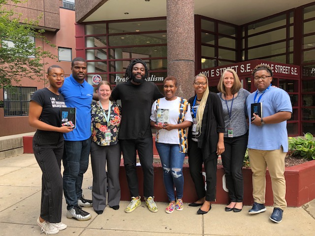 Jason Reynolds with Free Minds staff
